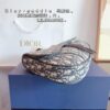 692f11bf4ecd253cf1078dbe Dior Saddle Bag Homme - A Bold Statement in Streetwear Elegance