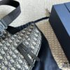 692f11c74ecd253cf1078dcf Dior Saddle Bag for Men - A Bold Take on the Iconic Saddle Design