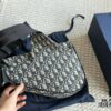 692f11ca4ecd253cf1078dd5 Dior Saddle Bag for Men - A Bold Take on the Iconic Saddle Design
