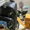692f14714ecd253cf10792c5 Authentic LV Men's Discovery Donald Duck Graffiti Backpack in Genuine Cowhide