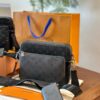 692f14e24ecd253cf1079387 Embossed Cowhide Black Monogram LV Men's Trio Three-in-One Messenger Bag in Black Knight Style