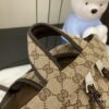 692f15524ecd253cf1079458 Gucci Logo Large Backpack in Beige and Ebony GG Canvas with Original Green Gift Bag