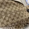 692f15534ecd253cf1079459 Gucci Logo Large Backpack in Beige and Ebony GG Canvas with Original Green Gift Bag