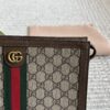 692f15794ecd253cf10794af Gucci Men's Classic Clutch