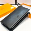 692f169d5464a31cf521a5e3 Hermès Black Leather Handheld Clutch Bag 21x10 Model 90095