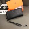 692f16a25464a31cf521a5ec Hermès Black Leather Men's Clutch Bag 21x10 Model 90095 with Card Slots and Phone Pocket
