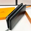 692f16a55464a31cf521a5f2 Hermès Black Leather Handheld Clutch Bag 21x10 Model 90095