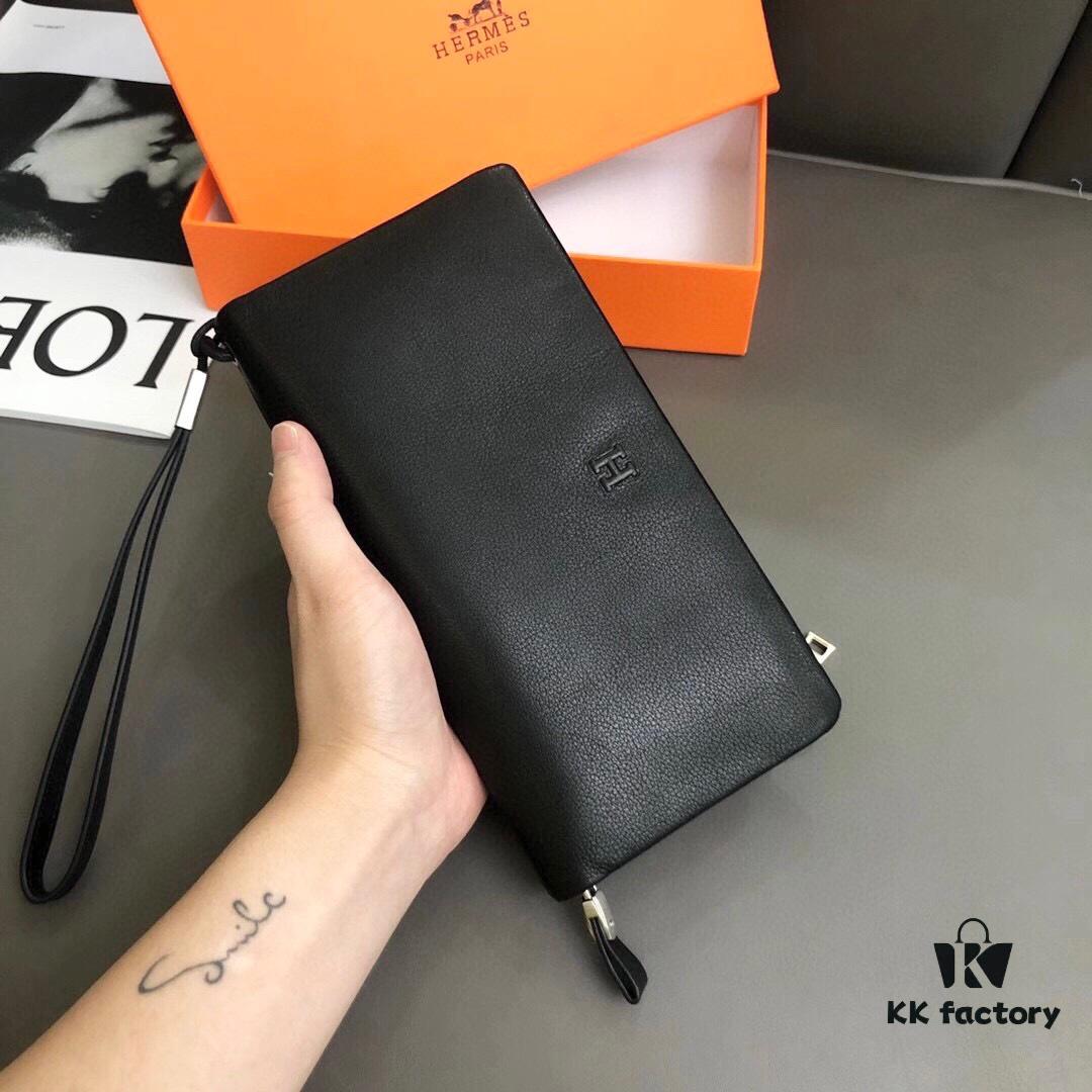 692f16ac5464a31cf521a602 Hermès Black Leather Men's Clutch Bag 21x10 Model 90095 with Card Slots and Phone Pocket