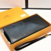 692f16e15464a31cf521a661 Hermès Black Leather Clutch - 21x10, Model 90095