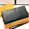 692f16e25464a31cf521a662 Hermès Black Leather Clutch - 21x10, Model 90095
