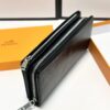 692f16e65464a31cf521a668 Hermès Black Leather Clutch - 21x10, Model 90095