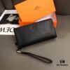 692f17435464a31cf521a722 Hermès Black Leather Handheld Clutch Bag 21x10 Model 90095