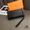 692faac699f2d84055c86339 Hermès Black Leather Handheld Clutch Bag 21x10 Model 90095