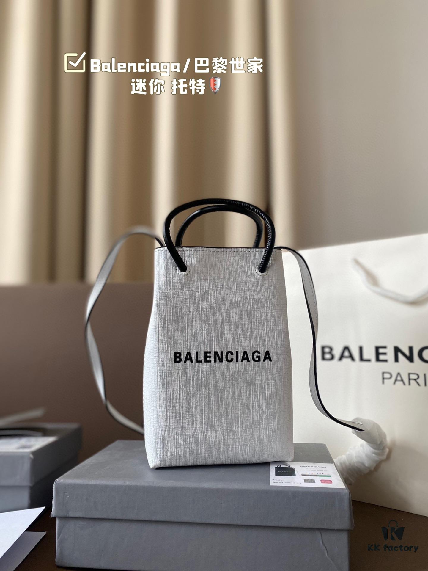 692fabcf99f2d84055c86514 Balenciaga Mini Tote Bag Limited Edition at Boutique, Featured by Entertainment Weekly - Stylish Black and White Design