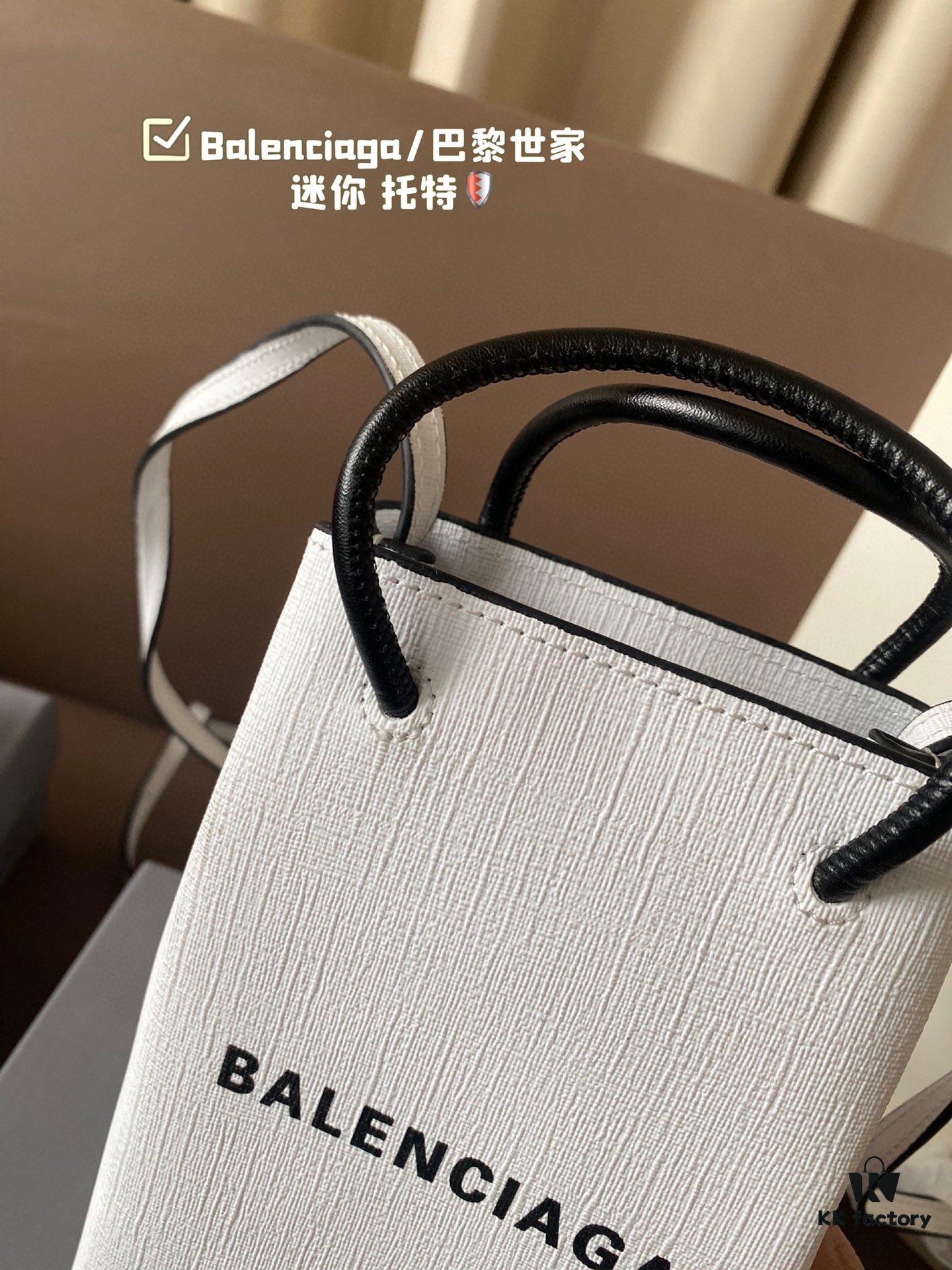692fabd199f2d84055c86517 Balenciaga Mini Tote Bag Limited Edition at Boutique, Featured by Entertainment Weekly - Stylish Black and White Design