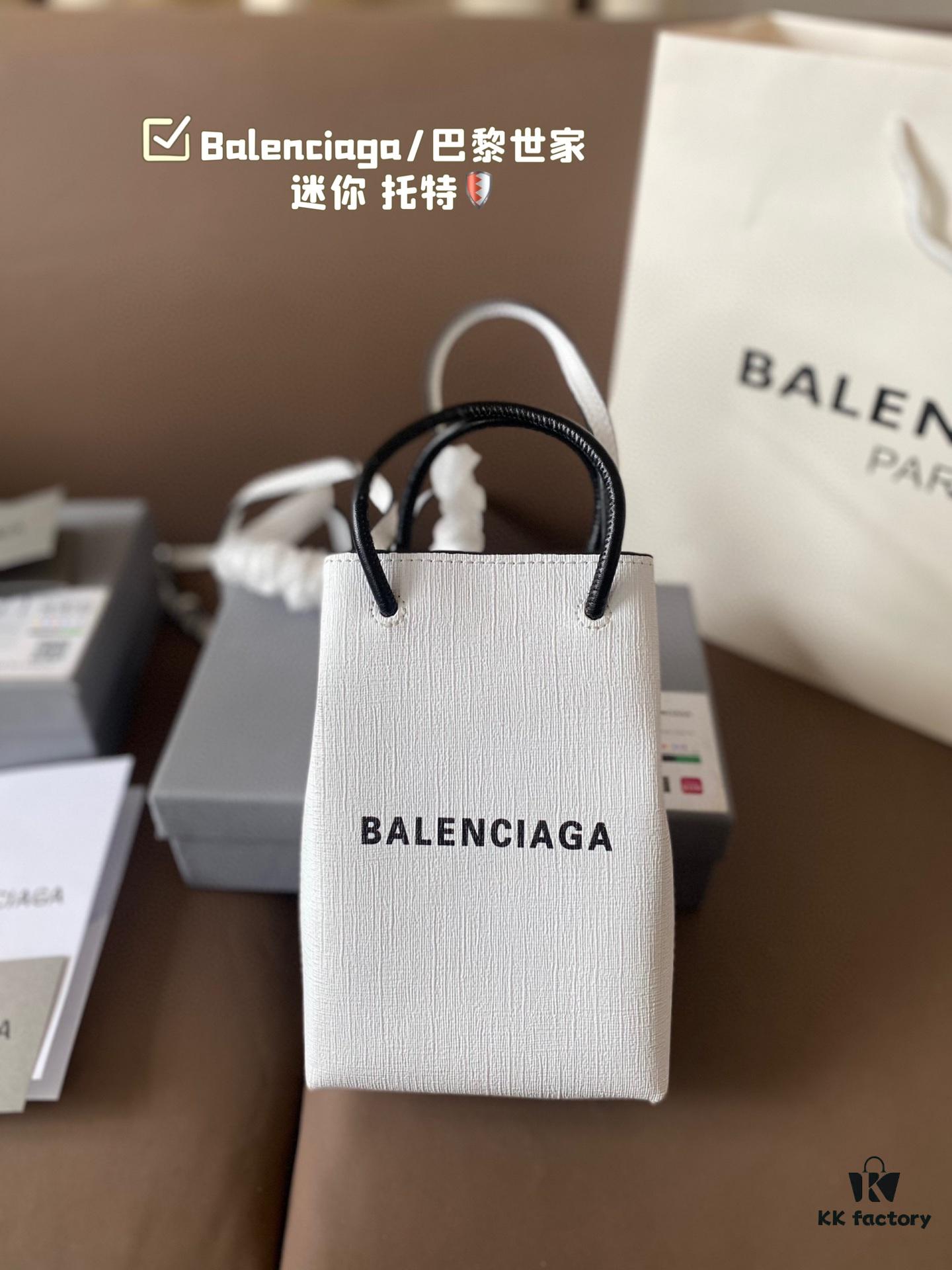 692fabd399f2d84055c8651a Balenciaga Mini Tote Bag Limited Edition at Boutique, Featured by Entertainment Weekly - Stylish Black and White Design
