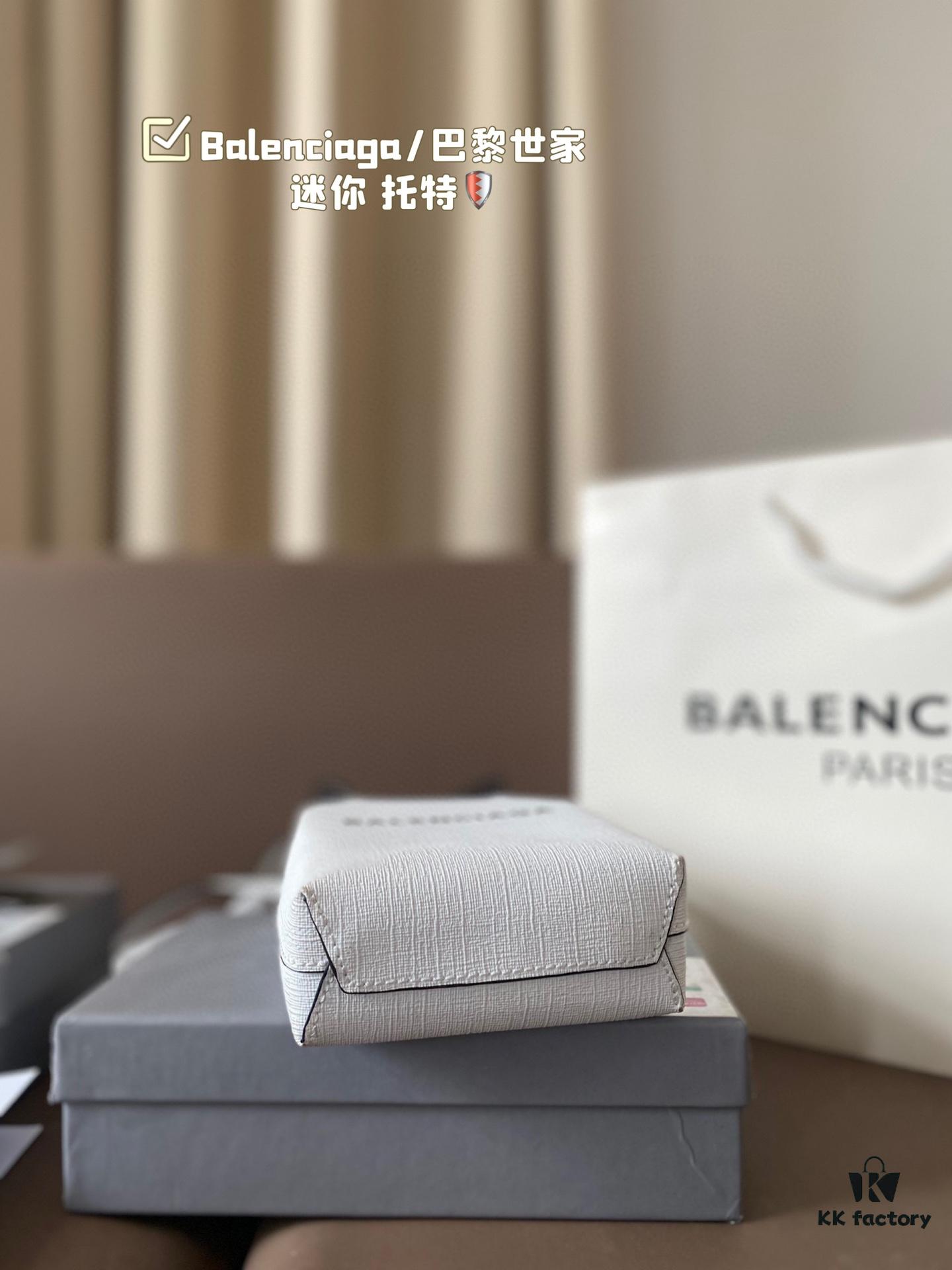 692fabd499f2d84055c8651b Balenciaga Mini Tote Bag Limited Edition at Boutique, Featured by Entertainment Weekly - Stylish Black and White Design