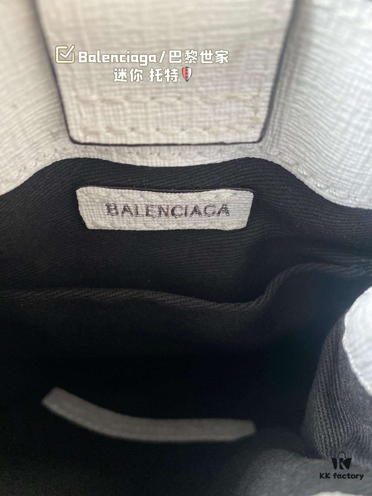 692fabd899f2d84055c86520 Balenciaga Mini Tote Bag Limited Edition at Boutique, Featured by Entertainment Weekly - Stylish Black and White Design