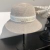 692fb06499f2d84055c86d0f Dior New Bucket Hat with Lettered Webbing