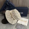 692fb1c599f2d84055c86f70 DIOR Bucket Hat, Ultra-Elegant with Deepened Silhouette Enhancing the Look, Featuring Contrasting Trim Embroidered with Bold 'Christian Dior Paris' Lettering