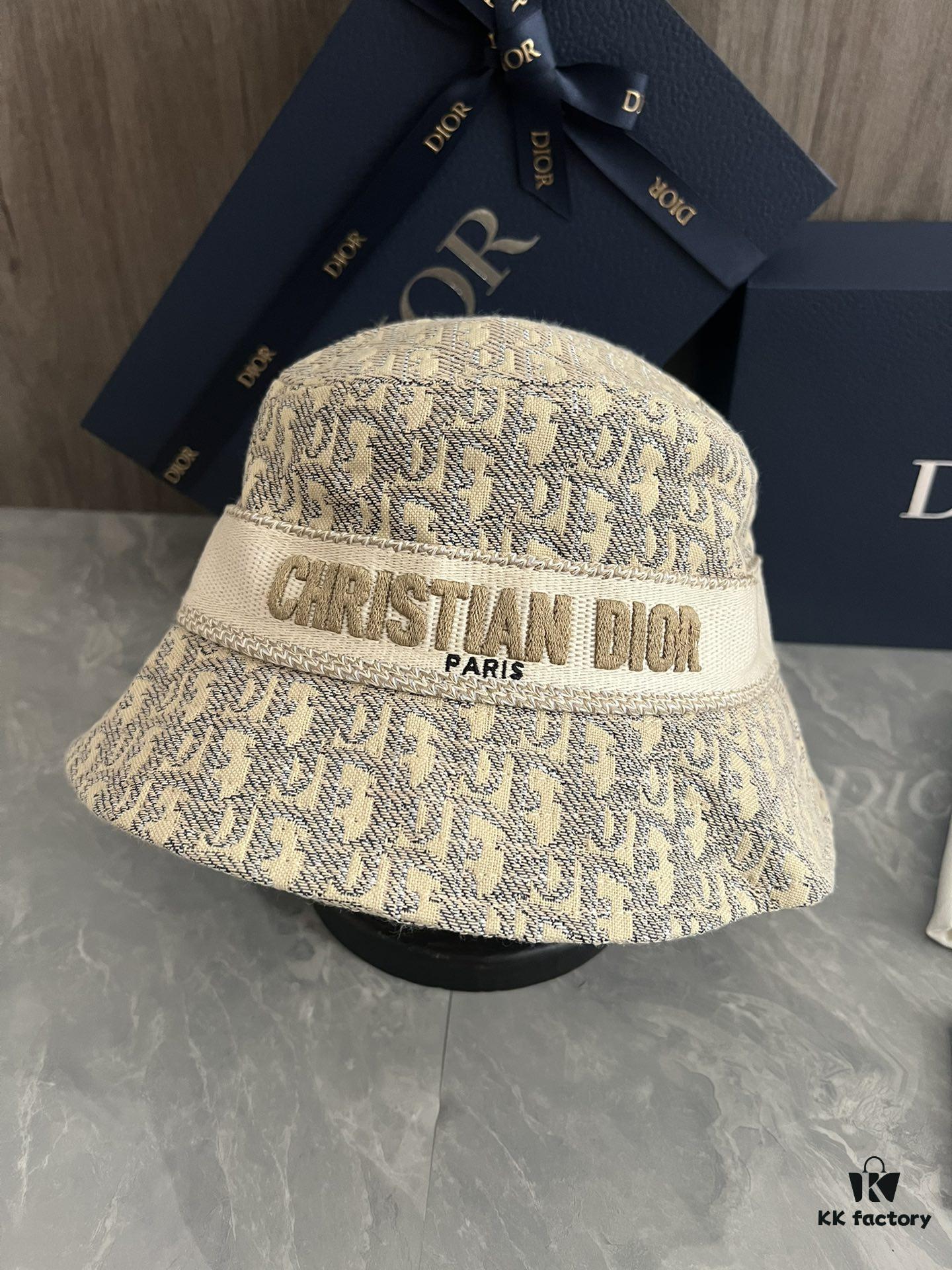 692fb1c599f2d84055c86f71 DIOR Bucket Hat, Ultra-Elegant with Deepened Silhouette Enhancing the Look, Featuring Contrasting Trim Embroidered with Bold 'Christian Dior Paris' Lettering