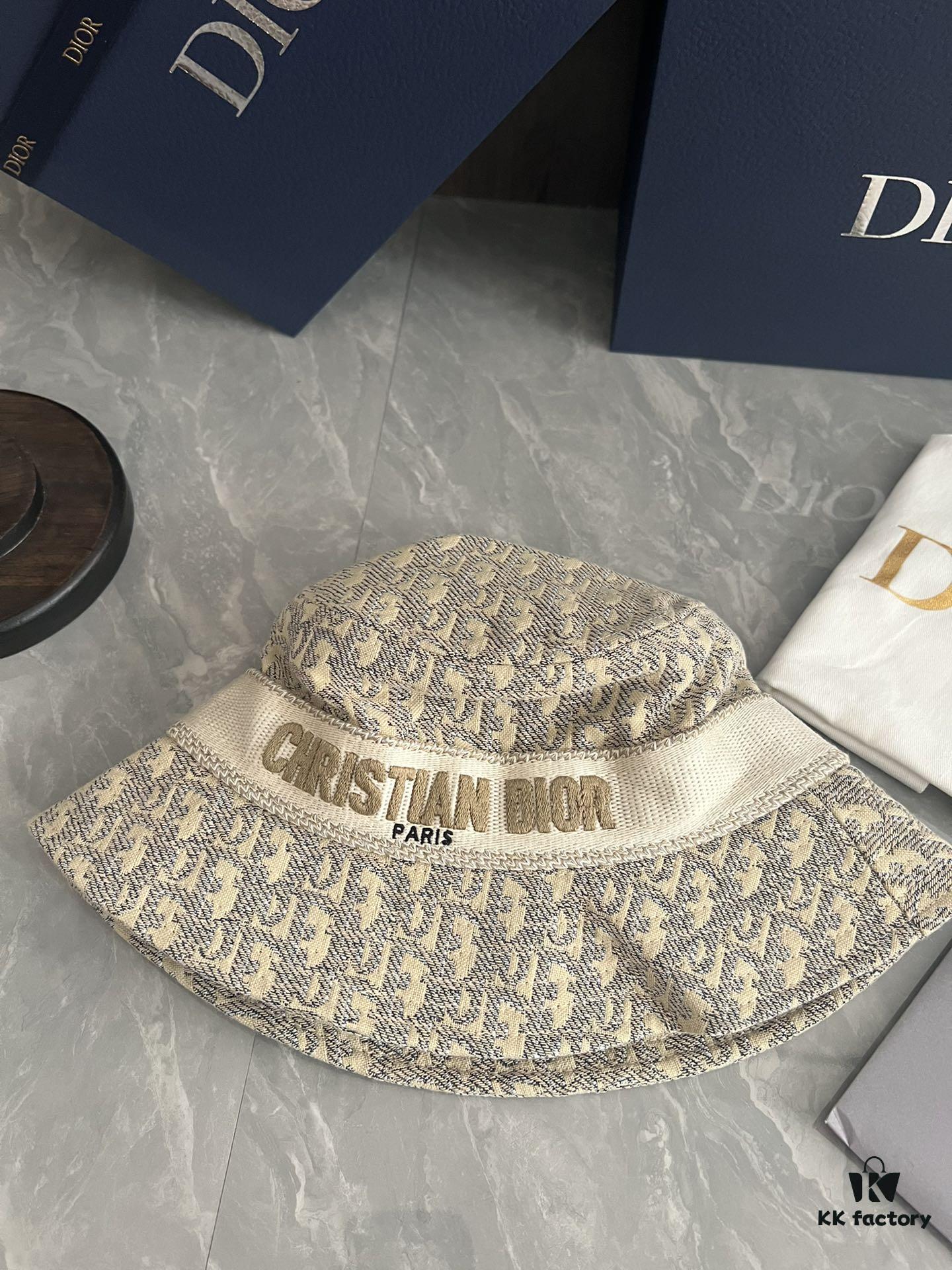 692fb1cb99f2d84055c86f76 DIOR Bucket Hat, Ultra-Elegant with Deepened Silhouette Enhancing the Look, Featuring Contrasting Trim Embroidered with Bold 'Christian Dior Paris' Lettering