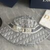692fb1d599f2d84055c86f84 DIOR Bucket Hat for Men and Women, Deepened Design Exudes Elegance, Contrasting Trim with Bold 'Christian Dior Paris' Logo Embroidery