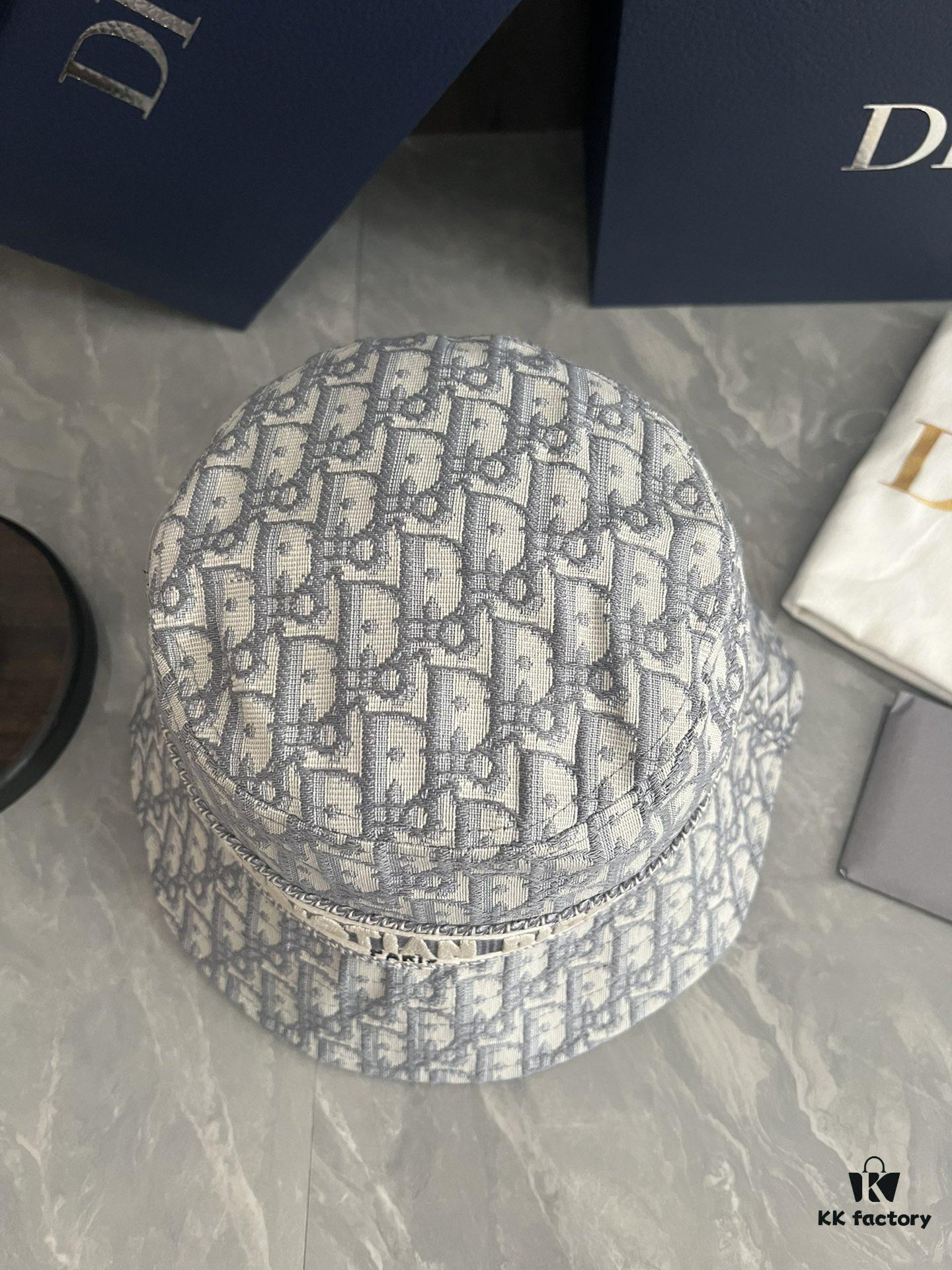 692fb1d699f2d84055c86f85 DIOR Bucket Hat for Men and Women, Deepened Design Exudes Elegance, Contrasting Trim with Bold 'Christian Dior Paris' Logo Embroidery