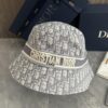 692fb22799f2d84055c86fd9 DIOR Bucket Hat for Men and Women, Deepened Design Exudes Elegance, Contrasting Trim with Bold 'Christian Dior Paris' Logo Embroidery
