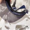 692fb46899f2d84055c872be Dior Original Custom Sun Hat with Innovative Design and Playful Sporty Style
