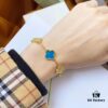 692fbe1699f2d84055c87e0d Van Cleef & Arpels 2019 New Arrival, 50th Anniversary Limited Edition Five-Flower Mother-of-Pearl Bracelet in Blue Ceramic and Gold