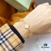 692fbe2299f2d84055c87e1f Van Cleef & Arpels 2019 New Release, 50th Anniversary Limited Edition Five-Flower Mother-of-Pearl Bracelet in Yellow Gold