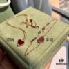 692fbe2d99f2d84055c87e2f Van Cleef & Arpels Sweet Alhambra Heart Pendant, Rose Gold with Red Jasper