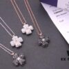 692fbe6899f2d84055c87e9d Swarovski Full Diamond Black and White Double-Sided Clover Necklace