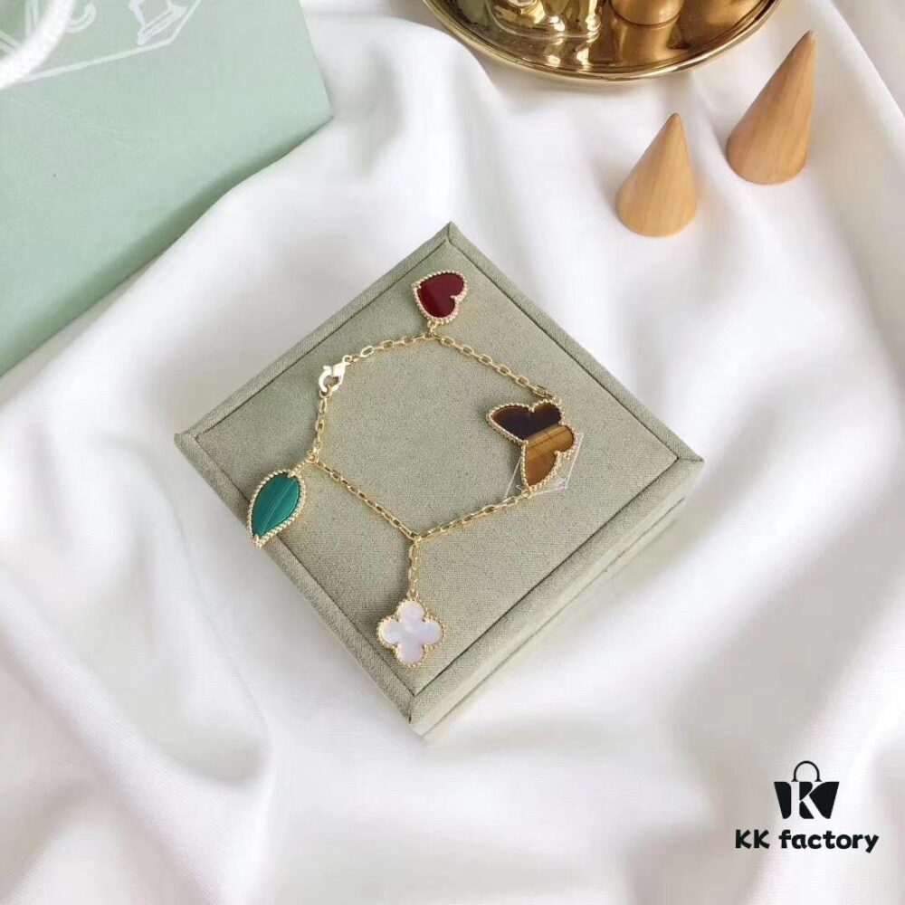692fbe8399f2d84055c87ec8 Van Cleef & Arpels Lucky Bangle Bracelet in Sterling Silver with Thick 18K Gold Plating, 4-Flower Mixed Design with Tiger's Eye, Carnelian, Malachite, and White Mother of Pearl