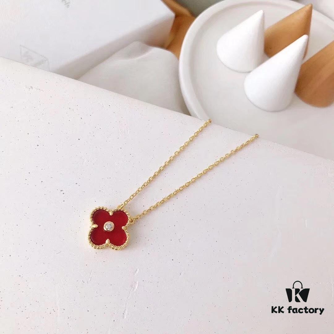 692fbea199f2d84055c87ef1 Red Carnelian / White Mother of Pearl / Black Onyx Van Cleef & Arpels Alhambra Clover Necklace, Sterling Silver with Thick Gold Plating