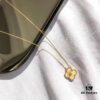 692fbeae99f2d84055c87f07 Van Cleef & Arpels Vintage Alhambra Christmas Collection, 18K Yellow Gold with Golden Mother-of-Pearl and Diamond Accent