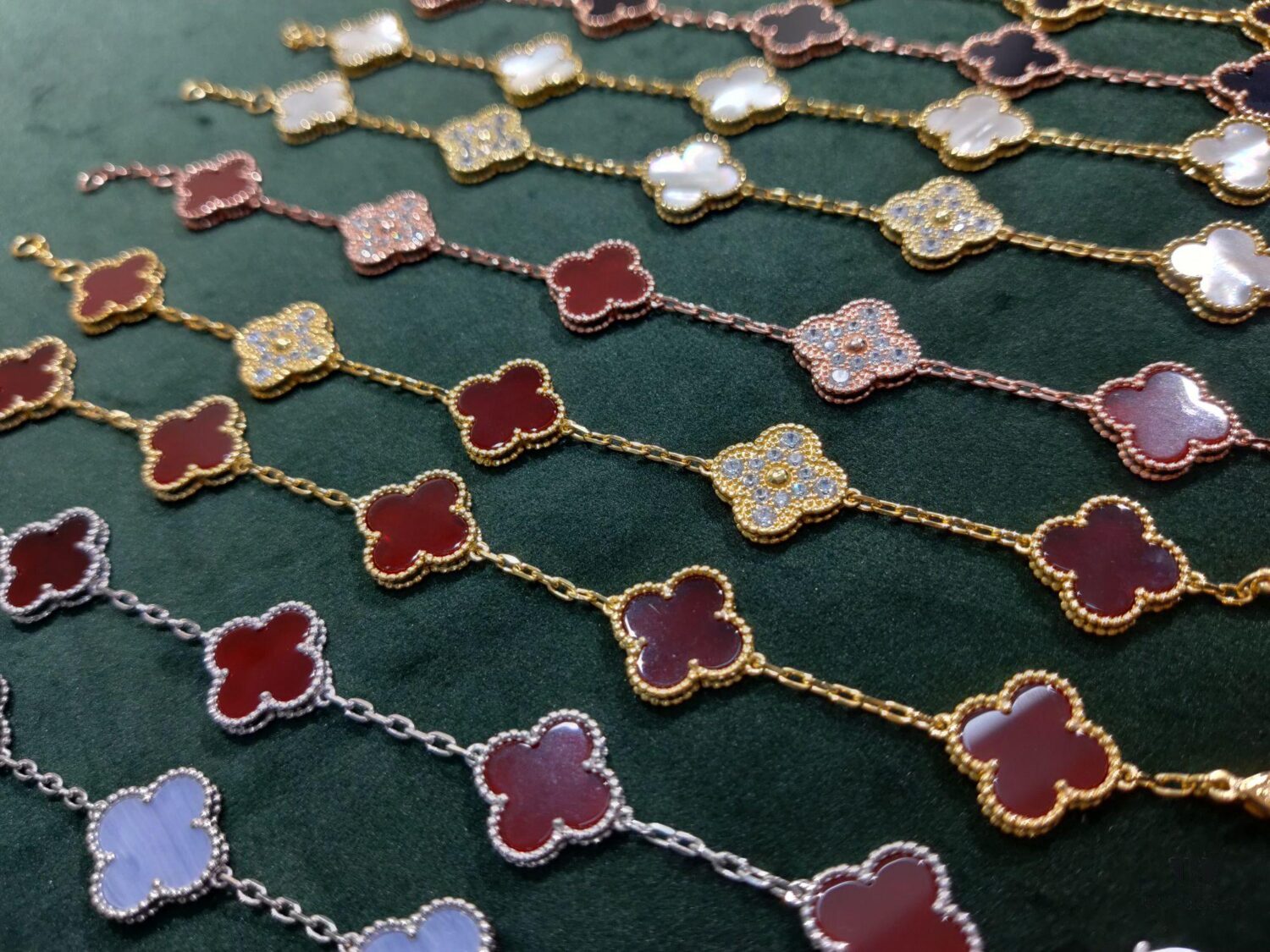 692fbee499f2d84055c87f5b Van Cleef & Arpels VCA Five-Flower Bracelet, Authentic Design! The four-leaf mother-of-pearl motif features smooth, elegant lines with hand-polished small beads for a full, three-dimensional appearance. Custom lobster clasp with exclusive anti-counterfeit code—each bracelet carries a unique identification number, ensuring authenticity. Hand-engraved chain links, each with four faceted surfaces, showcase impeccable craftsmanship and refined elegance. Beautiful when worn alone or layered.