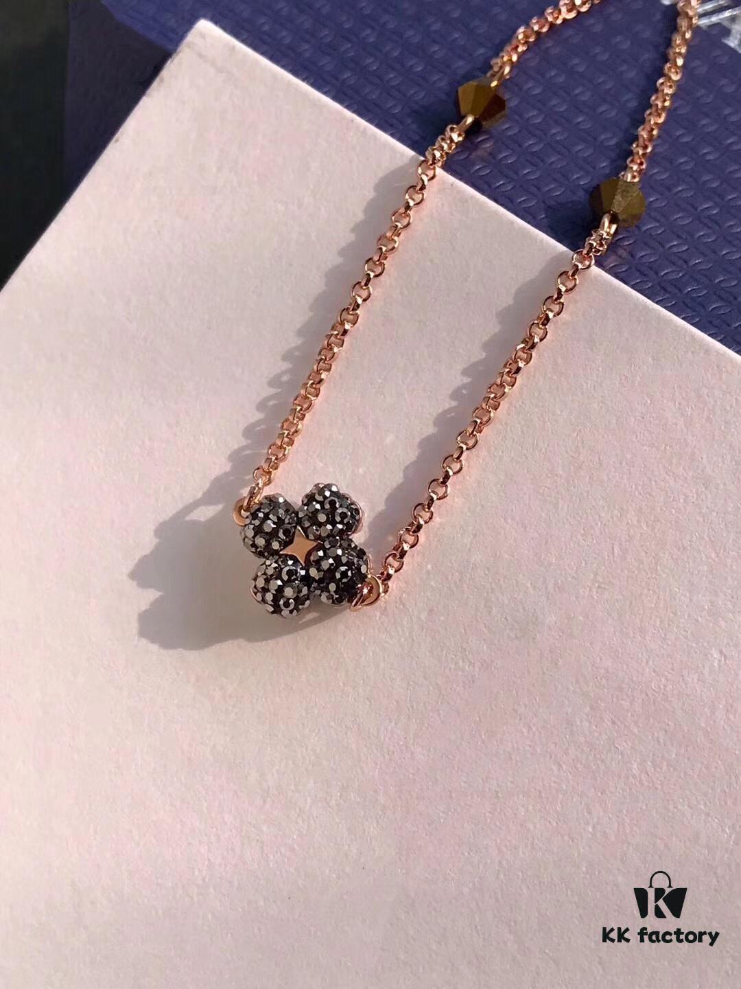 692fbf5499f2d84055c8800e Swarovski Lucky Clover Bracelet, Black and White Crystal Design with Magnetic Clasp