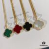 692fbfc899f2d84055c880aa VCA Van Cleef & Arpels Large Four-Leaf Clover Necklace, Sweater Chain – Four Colors Available: Natural Malachite, Red Carnelian, Black Onyx, and White Mother of Pearl