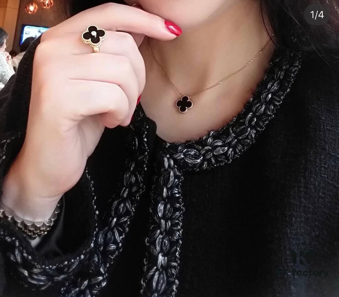 692fc0ce99f2d84055c8826a Clover Ring Inspired by Spring Rain, Featuring Yellow Gold Beaded Edge with Red Carnelian, Black Onyx, and White Mother-of-Pearl