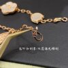 692fc16299f2d84055c8834e Lucky Spring Collection featuring ladybug and floral motifs, celebrating the rebirth of nature cherished by Van Cleef & Arpels. Crafted in rose gold, carnelian, and onyx, this collection enriches the Maison's enchanting connection with the natural world. Five meticulously handcrafted elements are delicately assembled into each piece. The chain is a specially customized thick design by Van Cleef & Arpels, with each link featuring eight faceted surfaces for enhanced sparkle. The tassel leaves are crafted with a crinkled foil texture for a refined, luxurious effect. The 'LG' engraving is discreetly placed on the side of the flower, while three totem stamps are embossed on the extension chain, and a serial code is engraved above the lobster clasp.