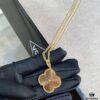 692fc21599f2d84055c8844c VCA New Double-Sided Guilloche Engraved Clover Long Necklace in Gold