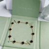 692fc26d99f2d84055c884df VCA Alhumbert Vintage Ten-Flower Yellow Gold Black Onyx Necklace