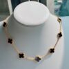 692fc26f99f2d84055c884e2 VCA Alhumbert Vintage Ten-Flower Yellow Gold Black Onyx Necklace