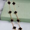 692fc27199f2d84055c884e6 VCA Alhumbert Vintage Ten-Flower Yellow Gold Black Onyx Necklace