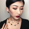 692fc31899f2d84055c885dc 50th Anniversary Limited Gray Mother-of-Pearl Clover Necklace