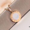 692fc3f599f2d84055c8873f Bvlgari Double-Sided Pendant Necklace with Natural Stone – One Side Red Agate, One Side White Mother-of-Pearl