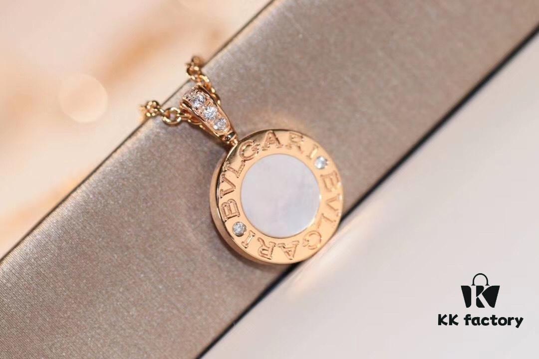 692fc3f599f2d84055c8873f Bvlgari Double-Sided Pendant Necklace with Natural Stone – One Side Red Agate, One Side White Mother-of-Pearl