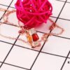 692fc3f599f2d84055c88740 Bulgari BVLGARI 2018 Red Agate and White Agate Diamond-Paved Snake Bone Pendant Necklace